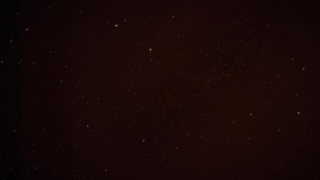 Abstract cinematic space background with drifting amber red glowing particles moving slowly through a quiet void