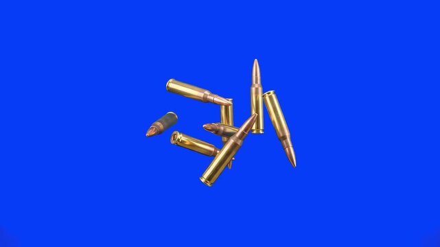 Shiny brass rifle bullets falling and scattering on a blue screen chroma key background. Great for action movie visual effects, military trailers, shooting scenes, war video games, and combat motion g