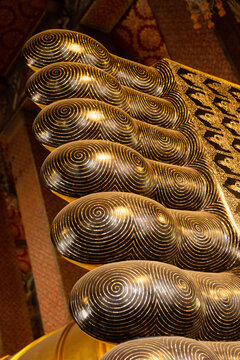 Close up of the soles of the Reclining Buddha giant feet with mother of pearl inlay at Wat Pho, Bangkok
