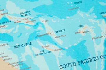 Close up view of vanuatu on a vintage political world map © Alejandro Bernal