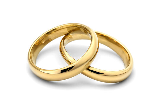 Two golden wedding rings joined together symbolizing marriage commitment and love