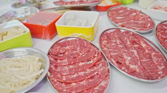 Close-up of sliced raw beef for Chinese hot pot