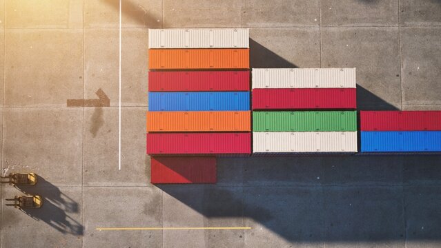 Industrial shipping terminal, aerial top view of intermodal freight containers. 3d rendering.