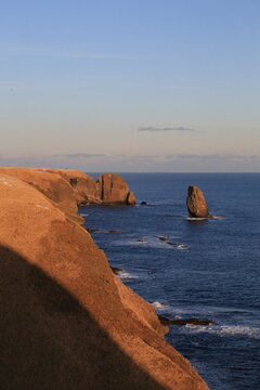 Golden evening light on the cliffs of Cape Namida, Hokkaido, Japan