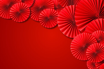 Fototapeta premium Vibrant red fans set a festive backdrop