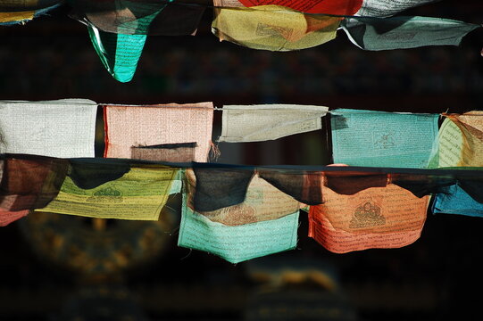 Colorful prayer flags fluttering in the wind