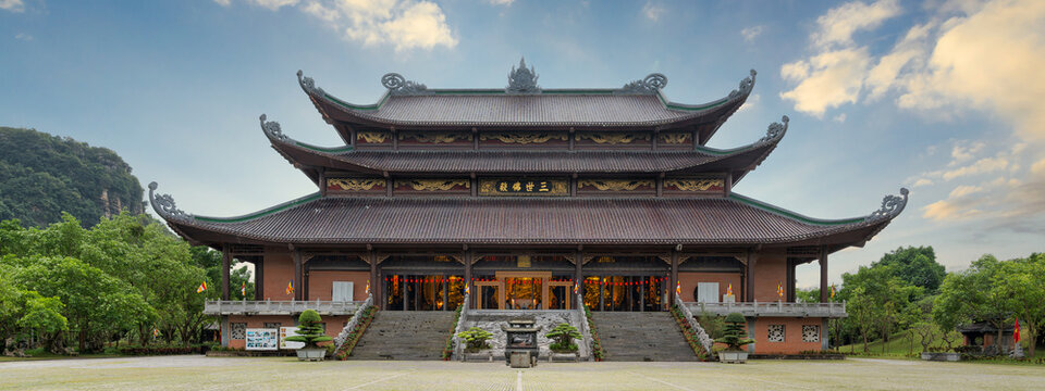 The Dien Tam The, or Three Periods Hall, at the magnificent Bai Dinh Pagoda complex in Ninh Binh, Vietnam, featuring grand traditional Buddhist architecture and ornate stone staircases