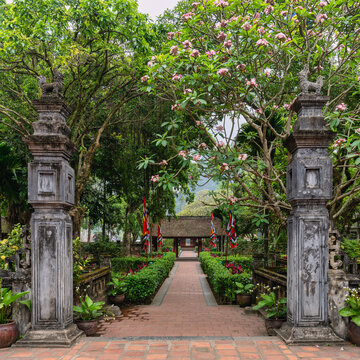 Stone gate and path leading to the Courtyard of the Temple of Emperor Le Dai Hanh in Hoa Lu Ancient Capital, Ninh Binh, Vietnam