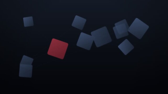 Red square standing out uniquely among multiple dark grey squares on a black background