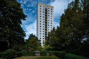 High-rise residential building surrounded by greenery in Marzahn, Berlin, Germany © Jrg