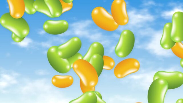 Colorful Green and Orange Jelly Beans Falling Against Blue Sky