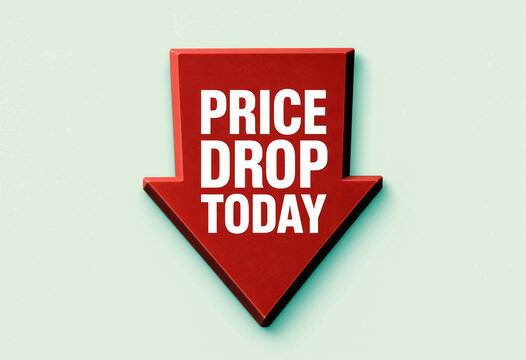 Bright red arrow sign with bold white text announcing a price drop today sale promotion