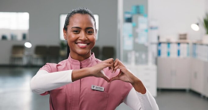 Face, smile and nurse with hand heart, kindness and nomination appreciation for medical support. Portrait, happy and woman at clinic with love gesture, thank you and gratitude for healthcare services