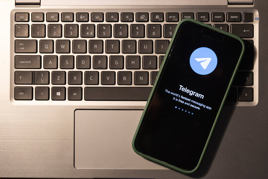 iPhone display with Telegram messaging and audio calling app
