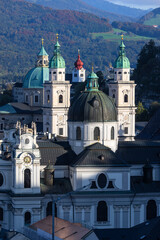 Salzburg Cathedral towers and domes against mountains © SNEHIT PHOTO