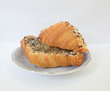 Martabak croissant. Croissant filled with grated cheddar cheese, chocolate sprinkles (meses), and crushed toasted peanuts
