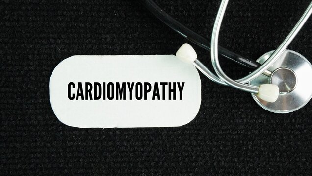 stethoscope and paper with the word Cardiomyopathy. disease of the heart muscle that makes it harder for your heart to pump blood effectively to the rest of your body.