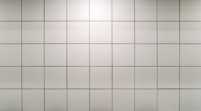 White ceramic tile background. Old vintage ceramic tiles in white to decorate the kitchen or bathroom 
