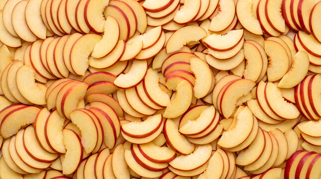 Fresh nectarine slices seamless background pattern top view, juicy ripe summer fruit texture directly above macro flat lay