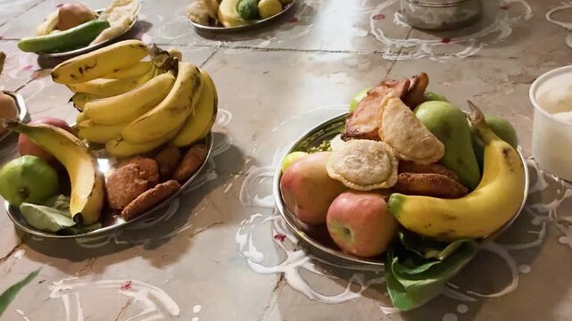 Indian Hindu Puja Ritual With Fresh Fruits Flowers And Traditional Offerings