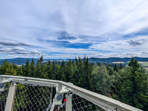 View From A Forest Observation Tower Over Trees And Distant Hills, Scenic Hiking Landscape