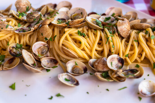 Close up view of Italian Spaghetti alle Vongole (Spaghetti with Clams), typical Mediterranean food in Italy.