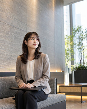 Young Japanese Woman Waiting for a Job Interview