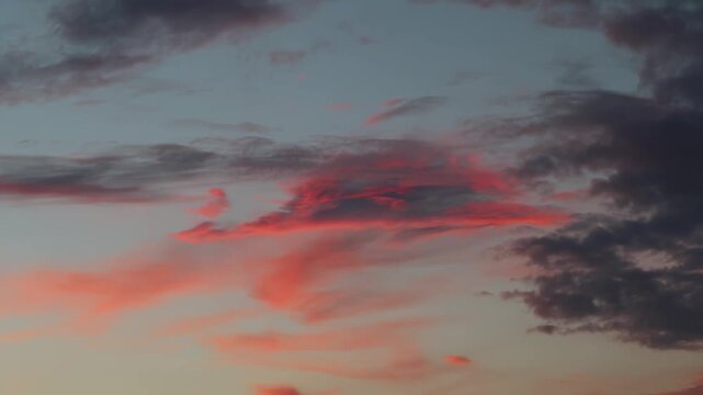 Dramatic Sunset Sky with Vibrant Red and Purple Clouds in Slow Motion