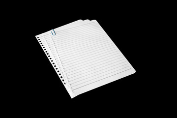 Notebook paper page isolated on black JPEG background, lying on a shelf. © vovan