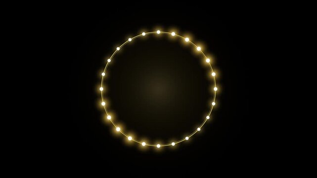 Glowing light bulbs arranged in a rotating circle on a dark background