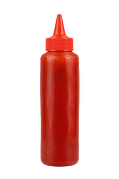 Vibrant red plastic squeeze bottle filled with spicy chili sauce stands upright on a clean white background, ready for use