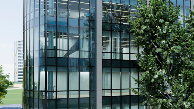 Modern office building with glass windows and tree in urban setting