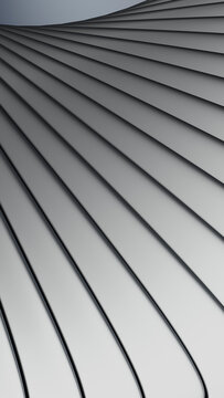 Stacked stainless steel spoons with reflective surfaces and smooth