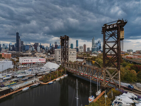 Canal street railway lift bridge with train and chicago skyline