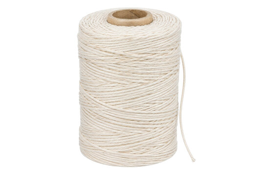 Tall spool of natural beige twine with a cardboard core is captured in a clean studio shot on a white background