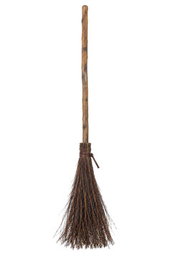 Traditional rustic witch's broom with a rough wooden handle and natural twig bristles, tied with a leather strap, isolated on a white background