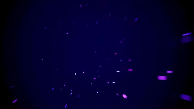 Colorful abstract light tunnel with glowing streaks and particles rushing toward a bright center, transitioning into deep blue space, digital motion background animation