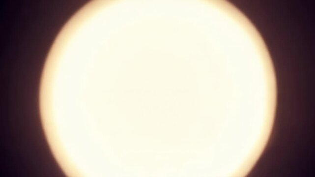 Abstract animation of blue and golden glowing particles swirling toward a bright central light, creating a dynamic tunnel effect on black background, digital motion graphic