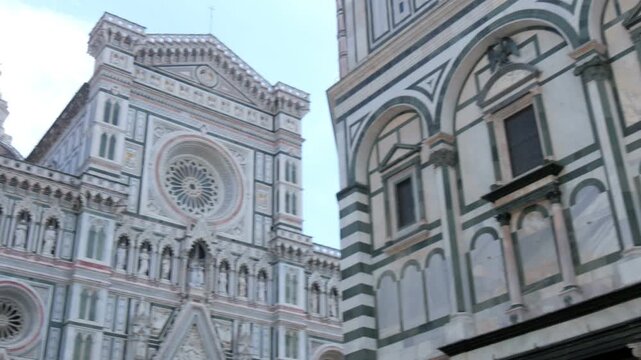 Florence Cathedral and Baptistery facade camera pan shot 4K real-time footage