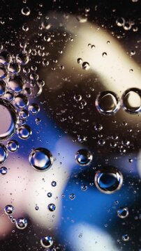 Macro Bubbles Floating in Oil Abstract Background
