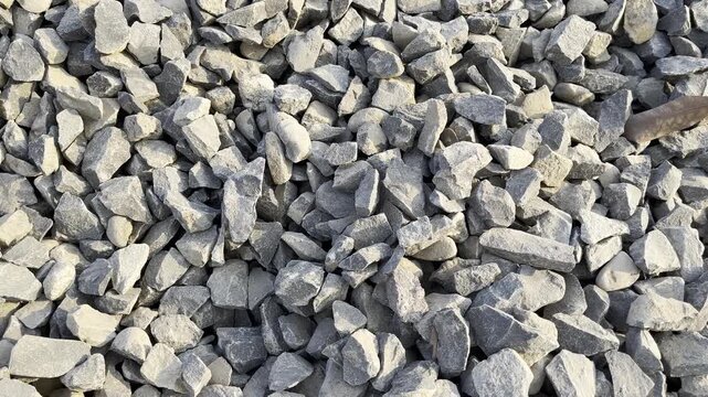 Close up view of building gravel stone pile at construction site