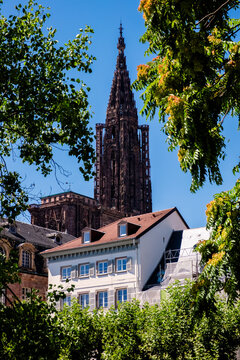 Details of Strasbourg city with a tower shining in sunlight