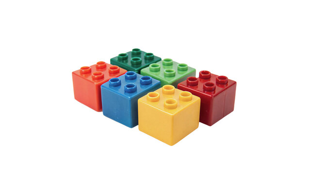 Stack of colorful plastic toy building blocks bricks on transparent background