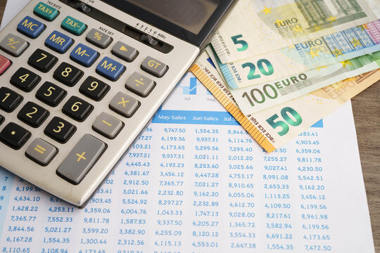 Calculator on chart graph paper. Finance, account, statistic, investment data economy, stock exchange business.