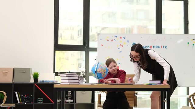 Woman mathematics teacher gives thorough explanation of challenging numerical problem. Attentive girl studies detailed explanation of teacher