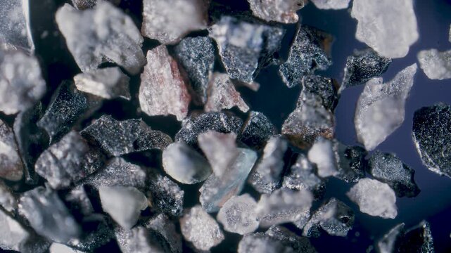 Silicon carbide abrasive powder grit 80 particles under microscope