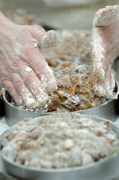 Panforte Margherita di Siena is a typical food from Siena Tuscany Italy. Preparing Panforte in a cake factory in Siena