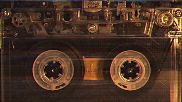 Vintage cassette player with rotating reels. Analog music, retro audio technology and nostalgia concept