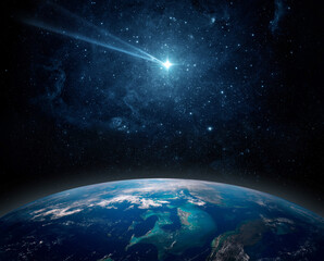 Comet, asteroid, meteorite flying to the planet Earth.  Glowing asteroid and tail of a falling comet threatening the safety of the Earth.  Elements of this image furnished by NASA. © Tryfonov