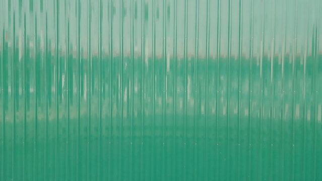 Green corrugated metal sheet texture surface background
